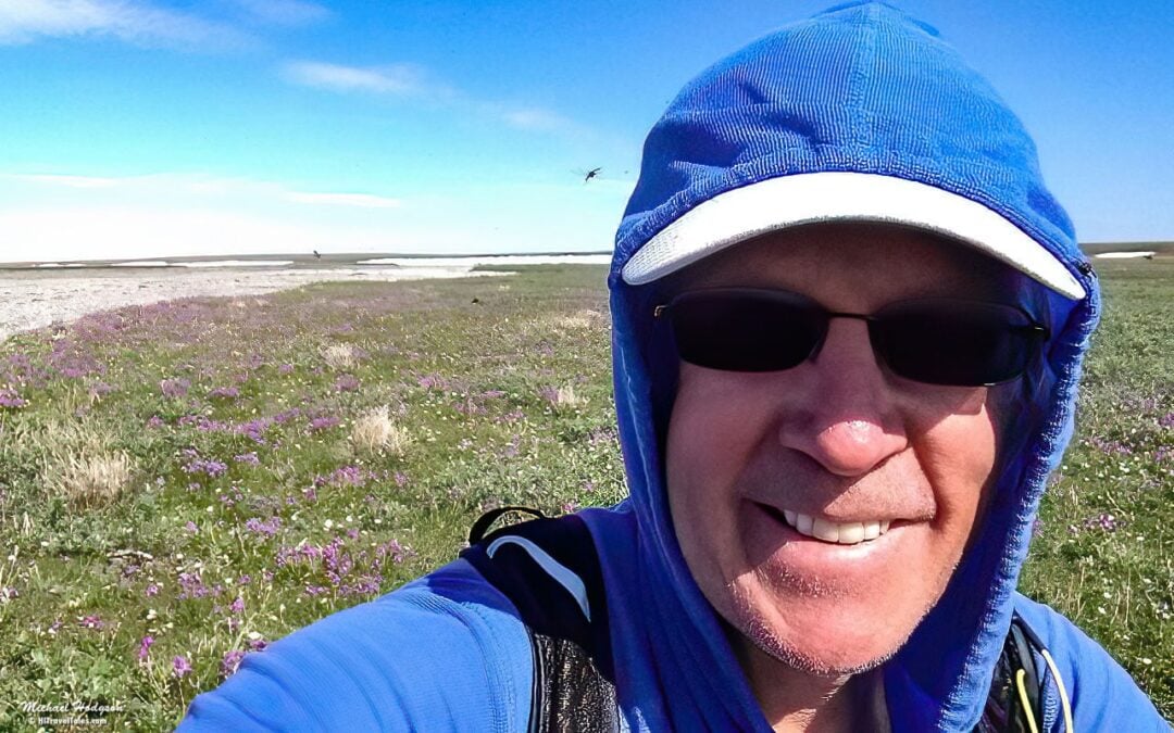 Grinning Under A Cloud Of Mosquitos In The Arctic National Wildl